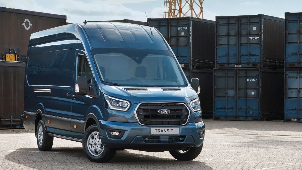 Image of a blue 2019 Ford Transit van parked in a stockyard.